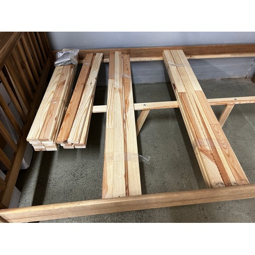 1543 - Pine bunkbeds - single top, 3/4 base. *This lot is subject to VAT