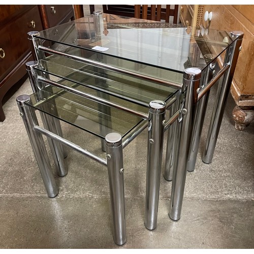 107 - An Italian chrome and glass topped nest of tables