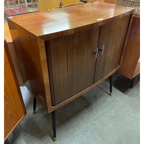 108 - A walnut and black tambour front record cabinet