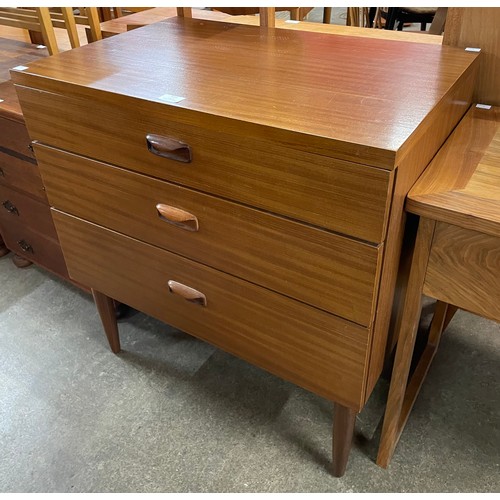 111 - A teak chest of drawers