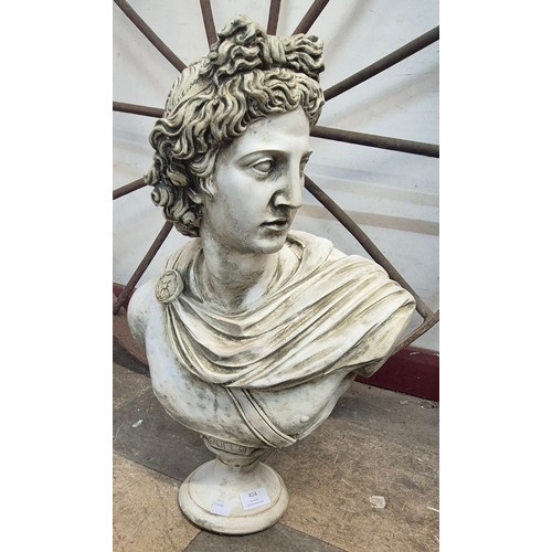 424 - A faux marble bust of a Apollo