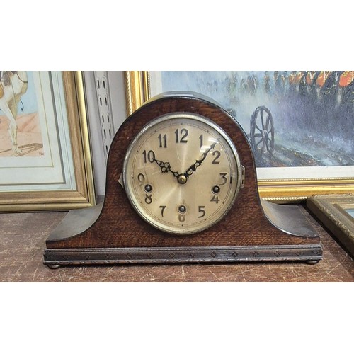427 - An oak mantel clock