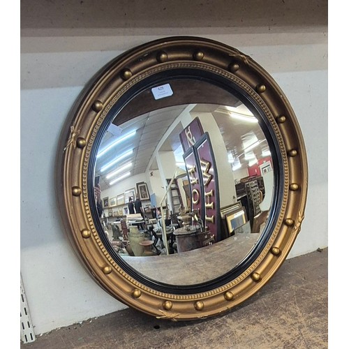 429 - A Regency style gilt framed convex mirror