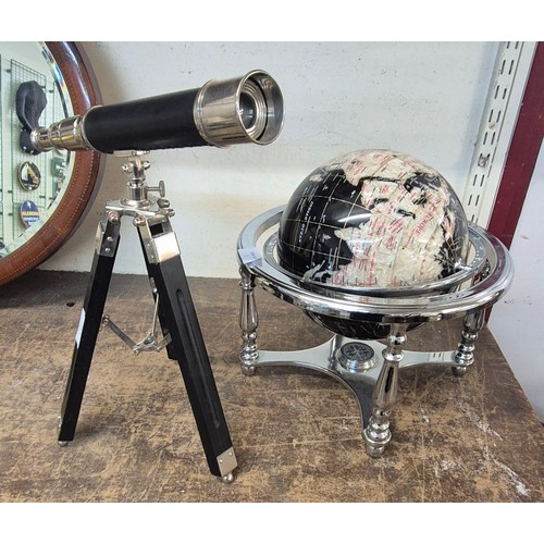 435 - A faux semi-precious stone terrestrial globe, on a chrome stand with compass and an ornate telescope