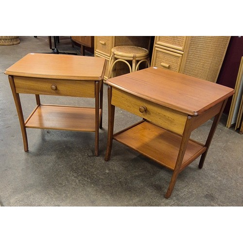 5 - A pair of teak single drawer lamp tables