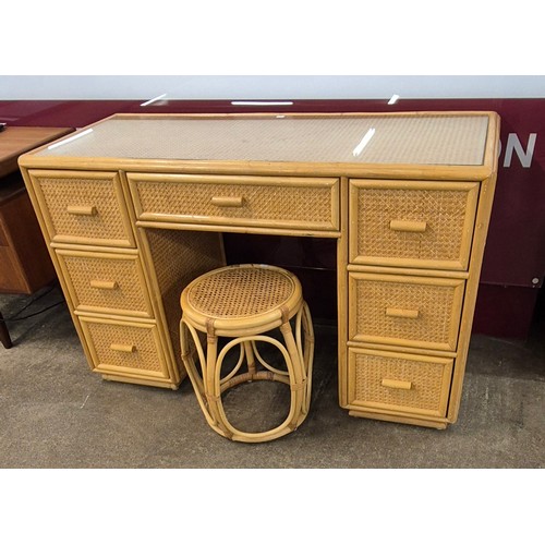 6 - An Italian style bamboo and rattan desk and stool