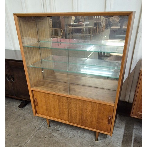 15 - A teak display cabinet