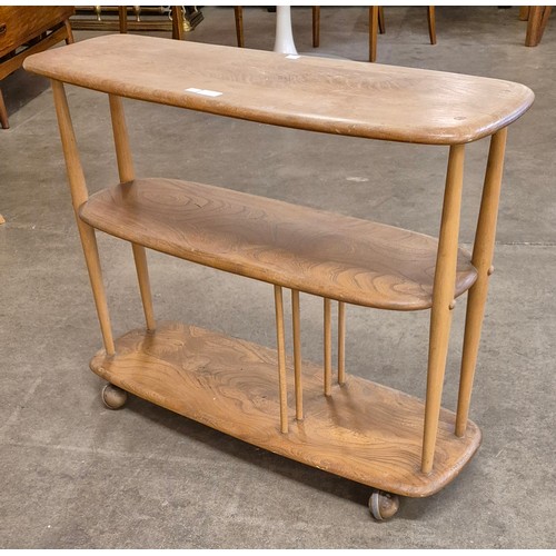 14 - An Ercol Blonde elm and beech three tier trolley