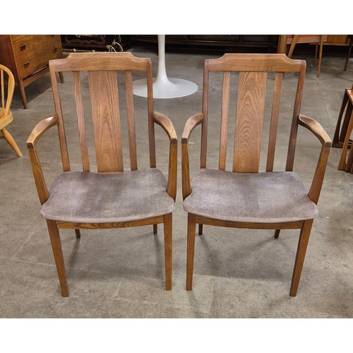 12 - A pair of G-Plan teak elbow chairs