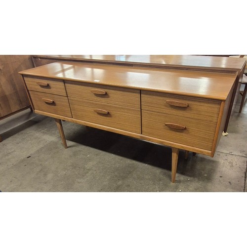 24 - An Austin Suite teak sideboard