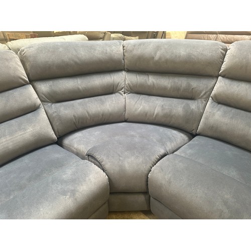 1352 - A grey velvet corner sofa with power headrests  *This lot is subject to VAT