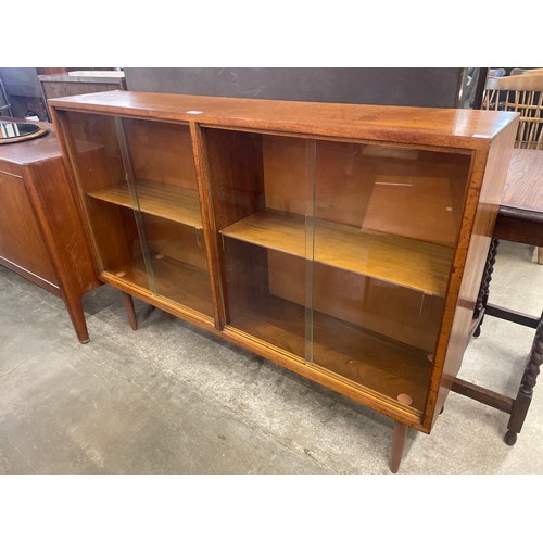 31 - A teak bookcase