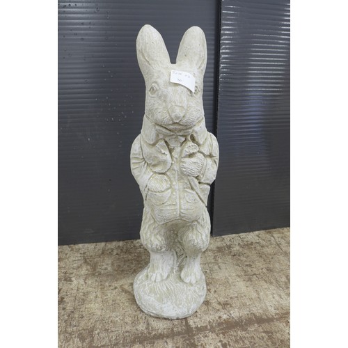 2305 - An stone effect concrete rabbit in a waistcoat