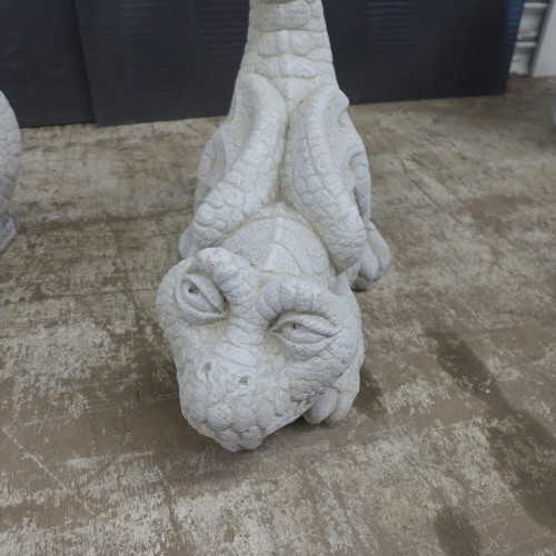 2306 - A pair of stone effect concrete caricature dragons