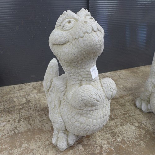 2306 - A pair of stone effect concrete caricature dragons