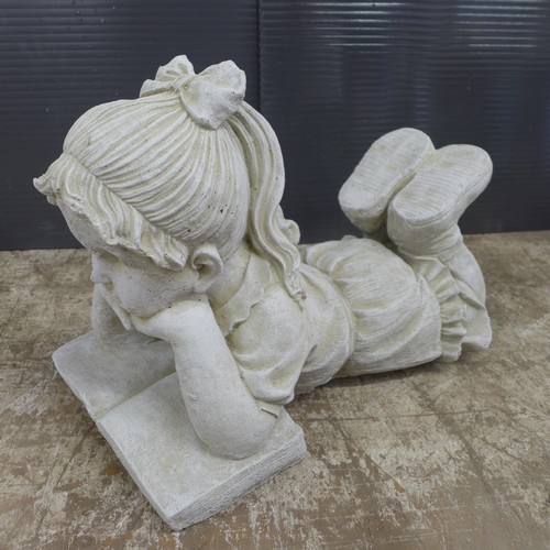 2309 - Two stone effect concrete garden ornaments of children reading