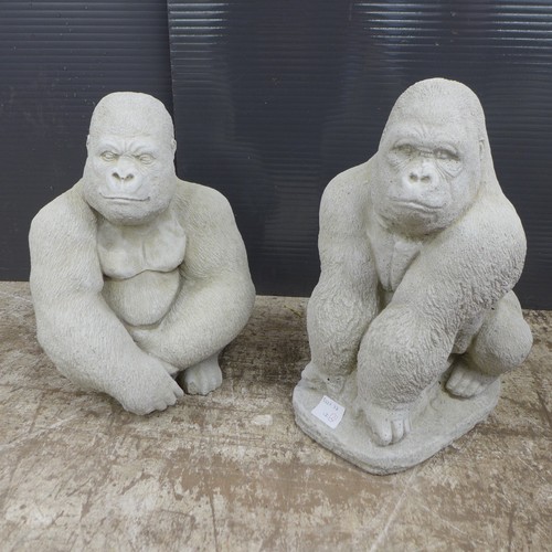 2313 - A pair of stone effect concrete gorillas