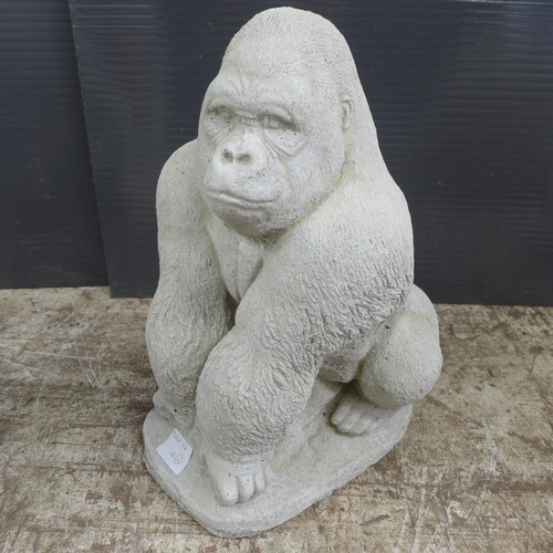 2313 - A pair of stone effect concrete gorillas