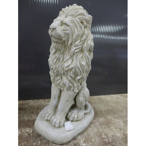 2317 - A pair of small stone effect concrete lion ornaments