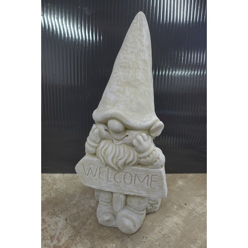 2324 - A trio of stone effect concrete gonk garden ornaments