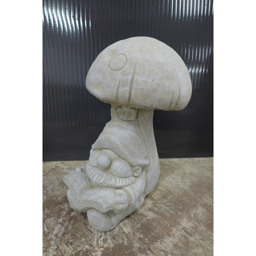 2324 - A trio of stone effect concrete gonk garden ornaments