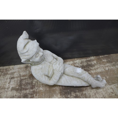 2325 - A stone effect concrete figure of an elf/pixie laying down