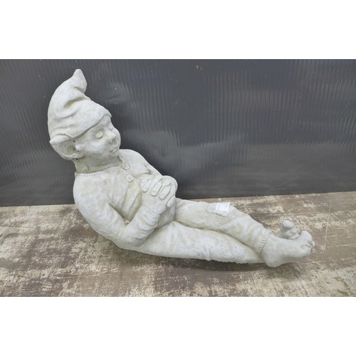 2325 - A stone effect concrete figure of an elf/pixie laying down