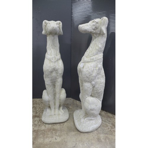 2327 - A pair of stone effect concrete greyhound ornaments