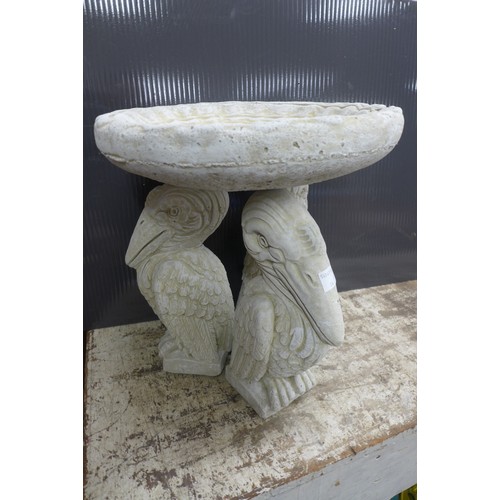 2328 - A stone effect concrete three pelican bird bath