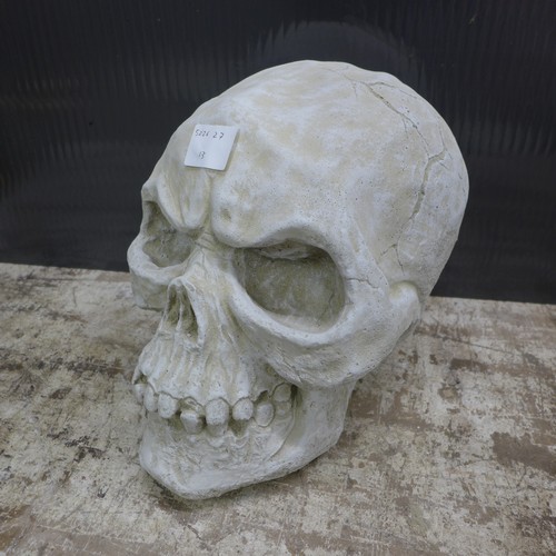 2330 - A large stone effect concrete ornament of a human skull