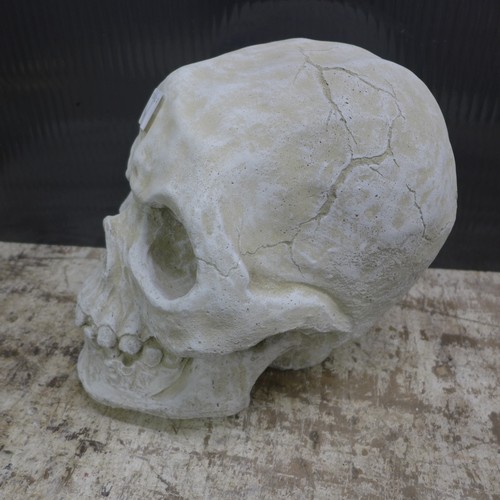 2330 - A large stone effect concrete ornament of a human skull