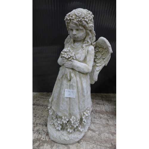 2331 - A stone effect concrete figure of an angel with a bouquet of flowers