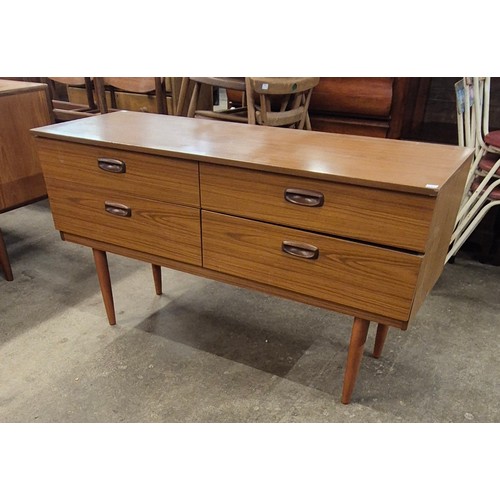 56 - A teak chest of drawers