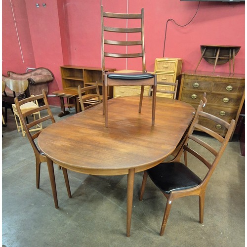 53 - A Danish Korup Stolefabrik teak extending dining table and six chairs, designed by Kai Kristiansen