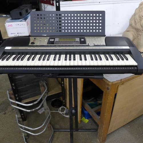 2217 - A Yamaha PSR-740 electronic synthesizer keyboard, keyboard stand and power supply