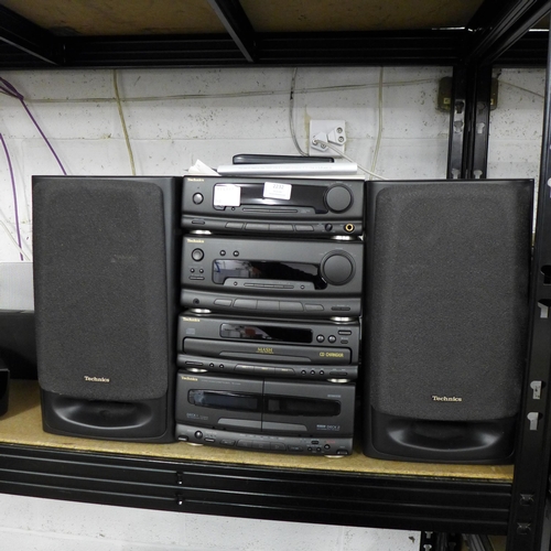 2232 - A quantity of Technics stereo equipment including an SH-CH650 stereo sound processor, an SA-CH655 st... 