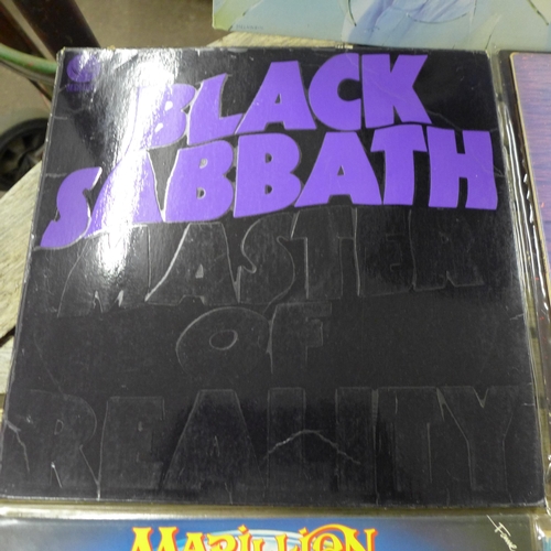 2236 - 12 rock LP records including Black Sabbath (Swirl label), Rush, Scorpions, Marillion, etc.