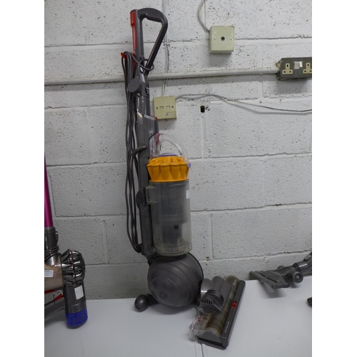 2249 - A Dyson DC40 upright vacuum cleaner and a Dyson DC34 handheld vacuum cleaner