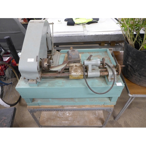 2265 - A vintage metal working lathe mounted on stand