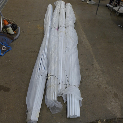 2297 - A quantity of assorted white plastic conduit (approximately 10ft in length)