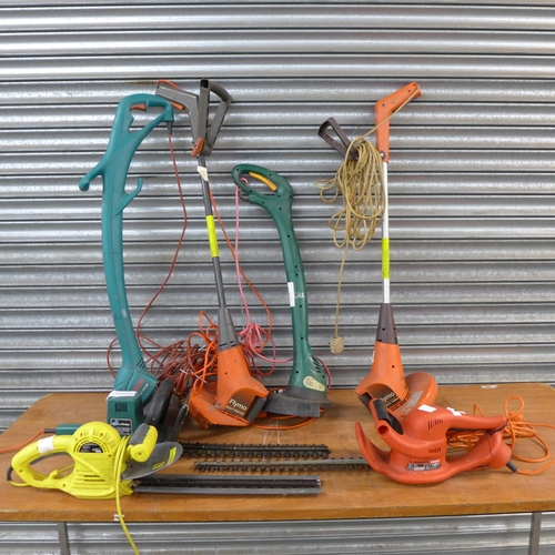 2303 - 7 assorted electric garden tools - 3 hedge cutters and 4 strimmers