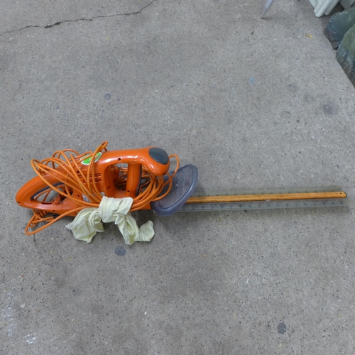 2346 - A quantity of hand tools and 10 large garden tools including a Flymo Easicut 450 hedge trimmer in bo... 