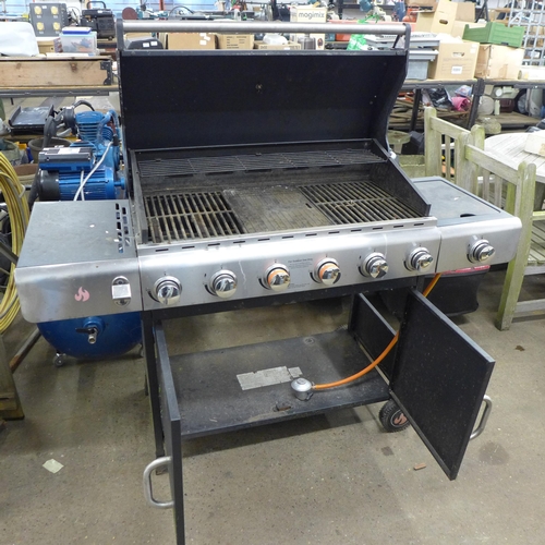 2366 - A Fire Pit six burner gas BBQ with one side burner