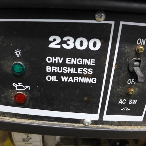 2382 - A 2300 OHV engine brushless petrol driven generator and a 25m extension reel