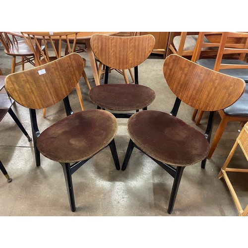 78 - A set of three G-Plan Librenza tola wood and black butterfly-back dining chairs