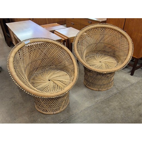 63 - A pair of Italian wicker ball shaped chairs