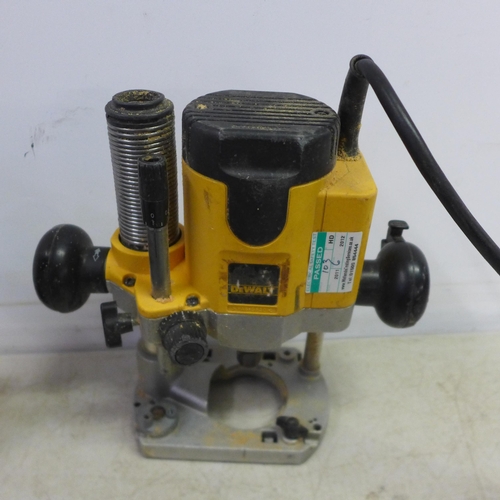 2001 - A quantity of power tools including a DeWalt DW620 230V plunge router, Makita 6280D 14.4V cordless d... 