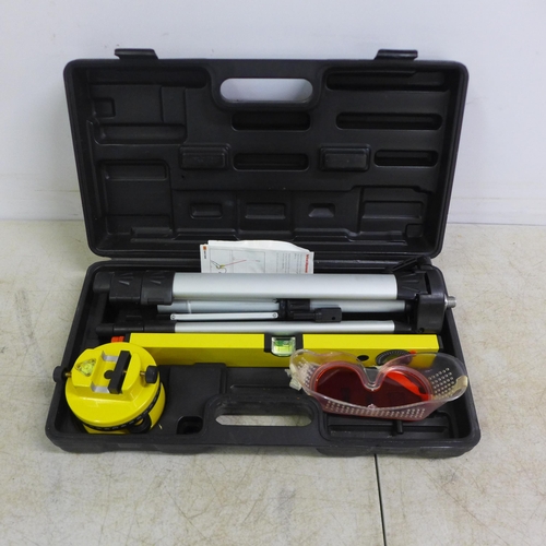 2012 - A Power Master laser level kit including a telescopic tripod stand, a laser spirit level, safety gog... 