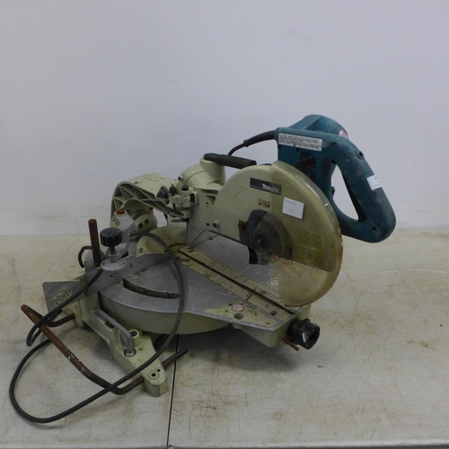 2017 - A Makita LS1013 240v compound mitre saw - no blade. This lot failed PAT testing, sold as scrap only