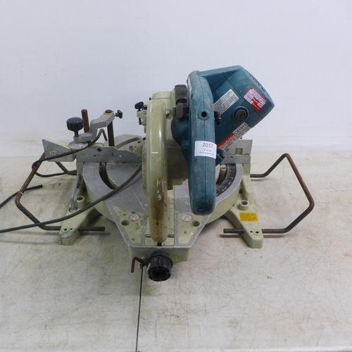 2017 - A Makita LS1013 240v compound mitre saw - no blade. This lot failed PAT testing, sold as scrap only